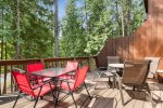Relax on your deck, take in the wooded view. 